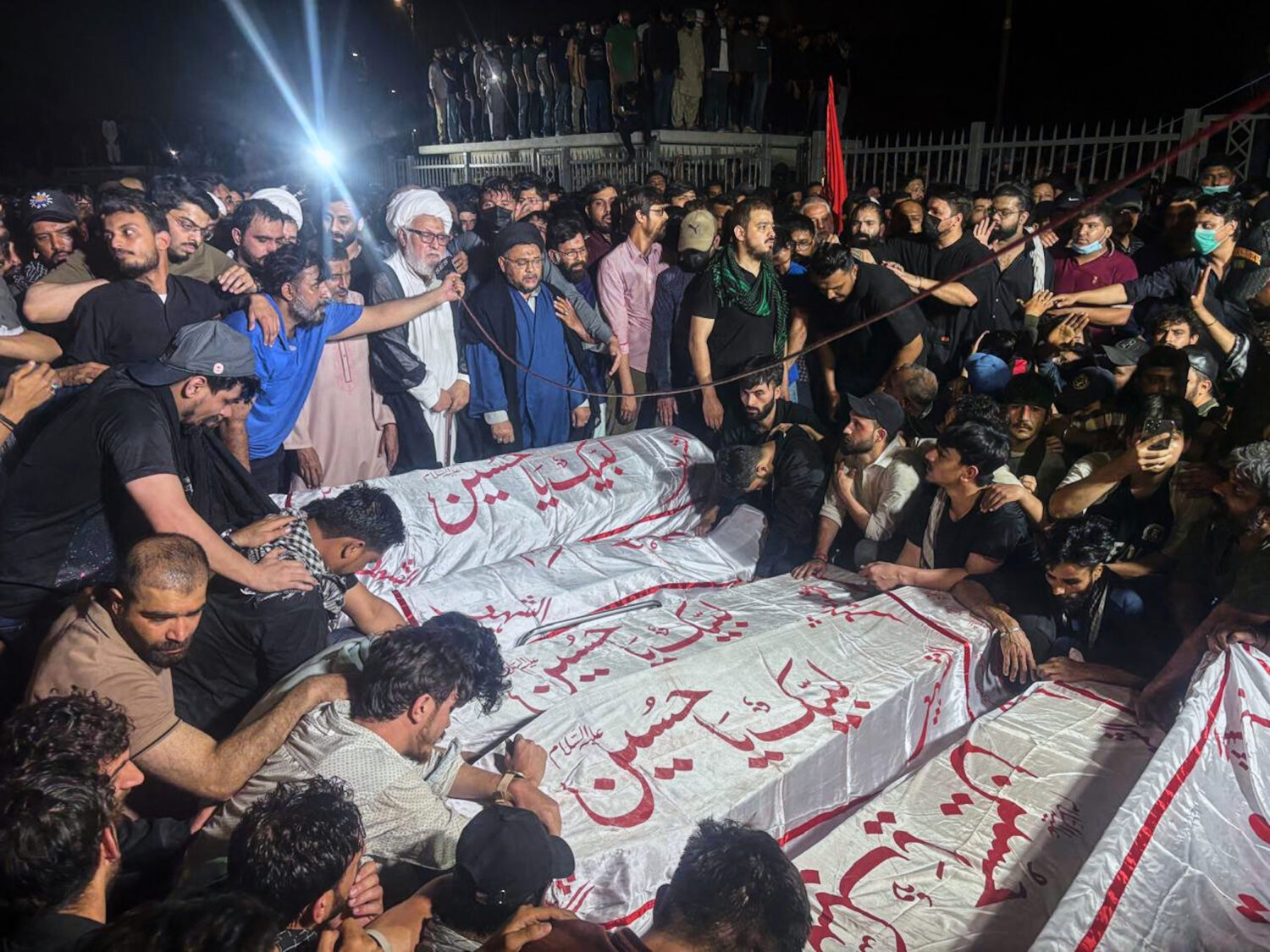 Shiite Muslims attend funeral prayer of protesters, who were killed in the violent clashes with sec...