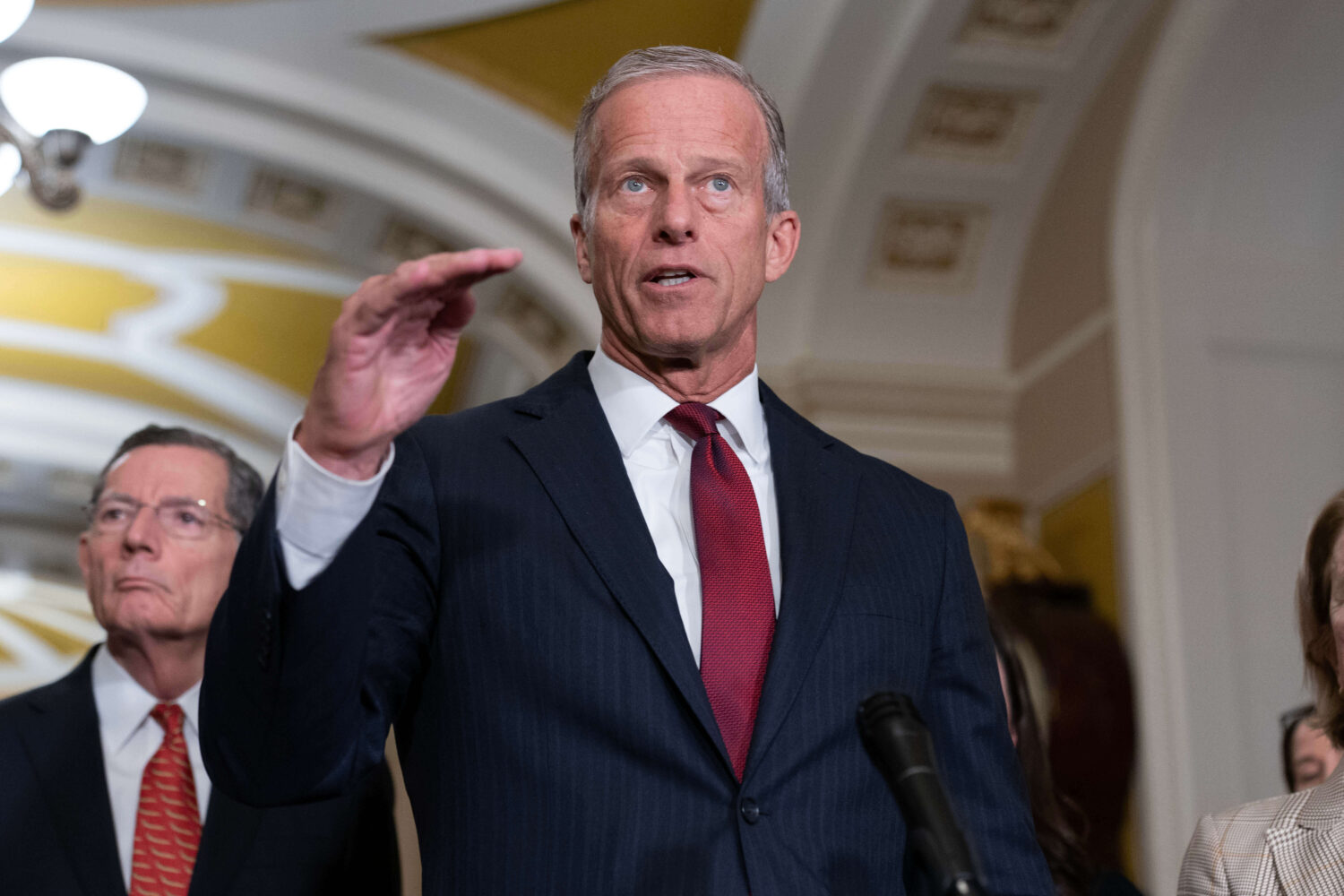 Senate Majority Leader John Thune, R-S.D., speaks to reporters after a weekly Republican luncheon, ...