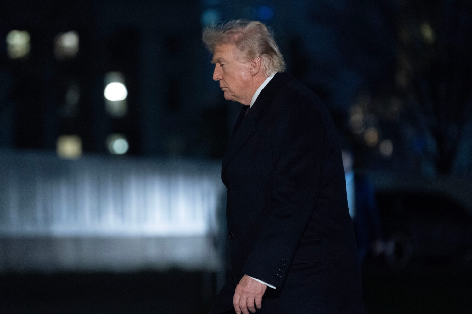President Donald Trump walks on the South Lawn upon his arrival to the White House, Sunday, March 1...