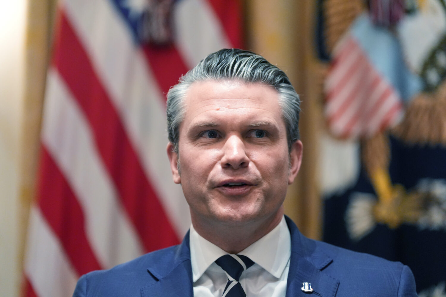 Defense Secretary Pete Hegseth speaks during a Cabinet meeting at the White House, Thursday, March ...