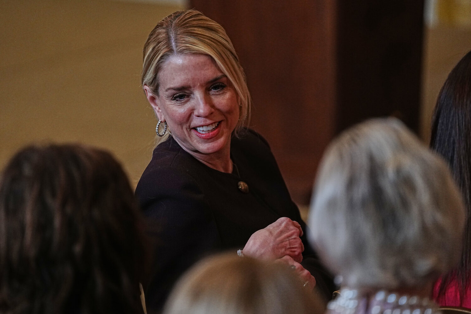 Attorney General Pam Bondi arrives before President Donald Trump attends a women's history month ev...