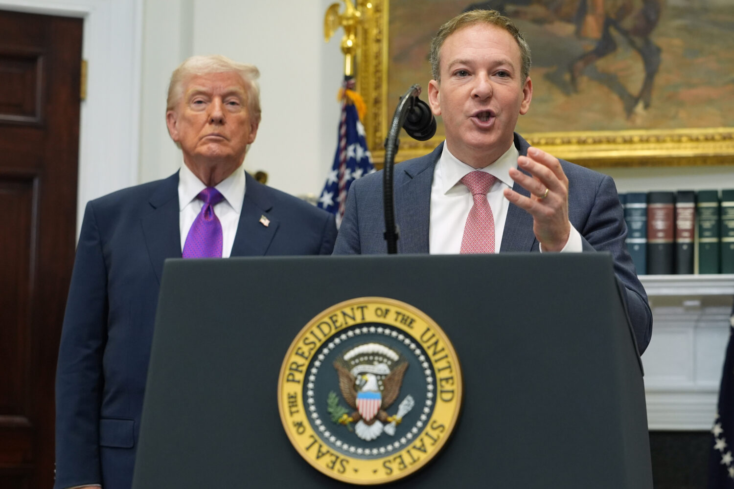 President Donald Trump listens as Environmental Protection Agency director Lee Zeldin speaks during...
