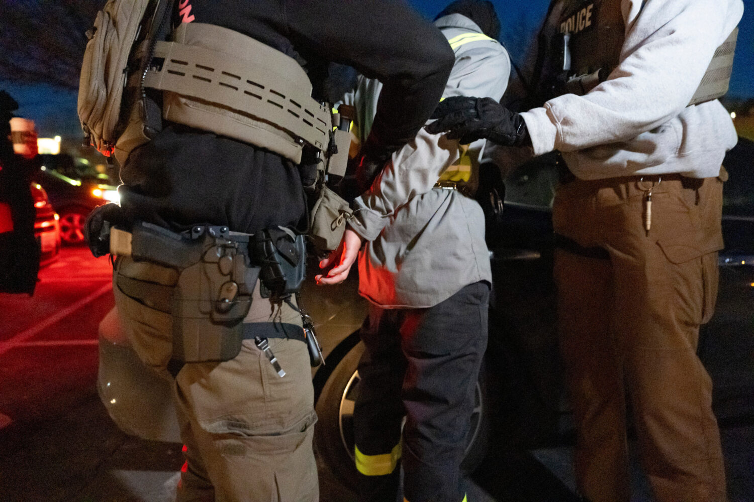 FILE - U.S. Immigration and Customs Enforcement officers detain a person, Jan. 27, 2025, in Silver ...