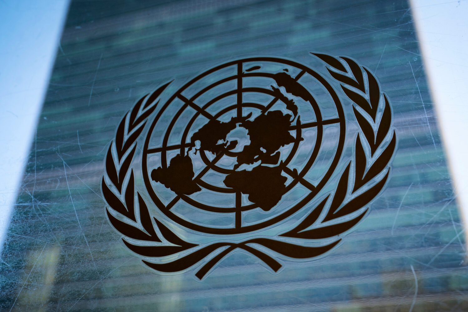 FILE - The symbol of the United Nations is displayed outside the Secretariat Building, Feb. 28, 202...