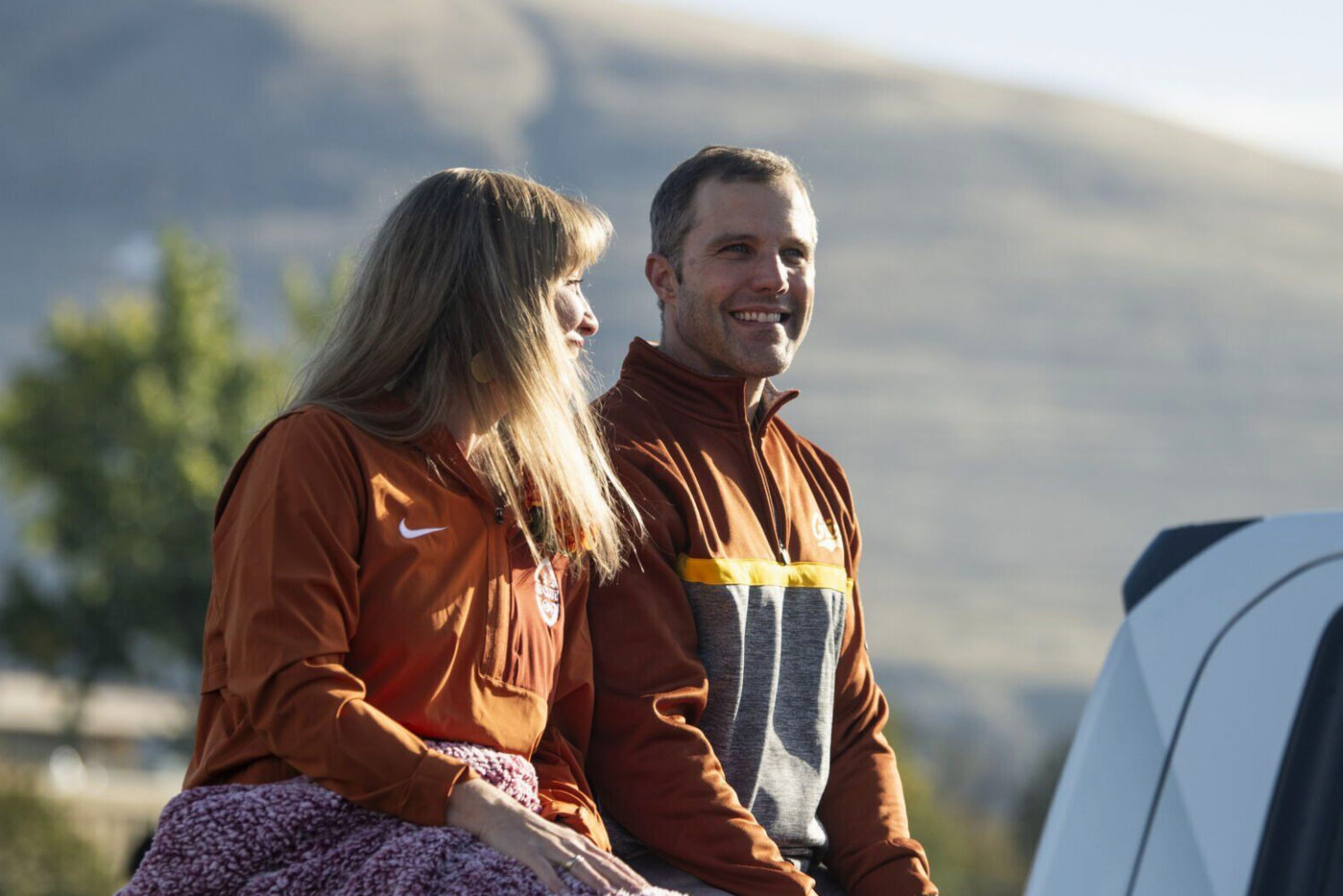 FILE - University of Montana President Seth Bodnar, right, and his wife, Dr. Chelsea Bodnar, ride i...