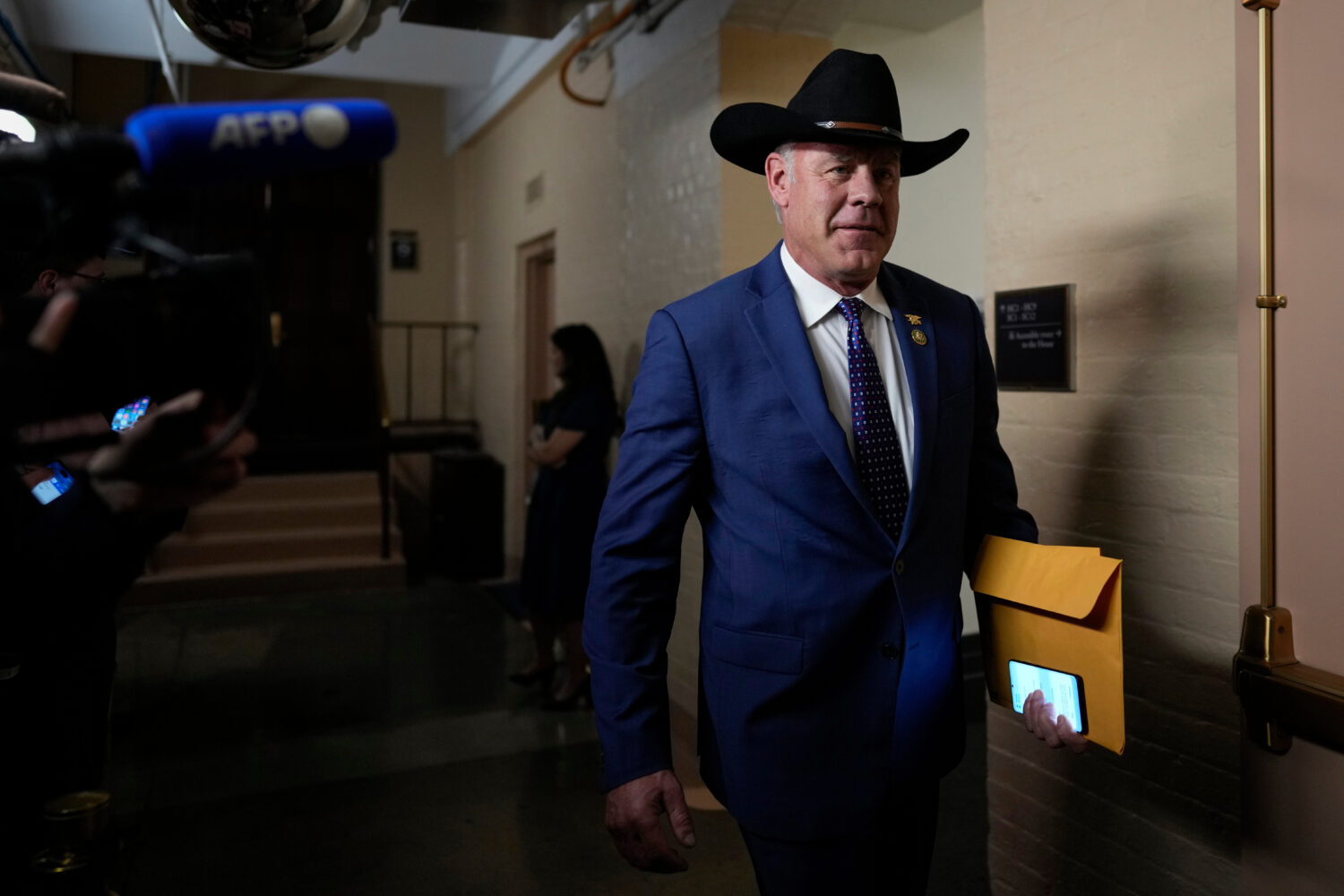 FILE - Rep.-elect Ryan Zinke, R-Mont., walks from a closed-door meeting with the GOP Conference dur...