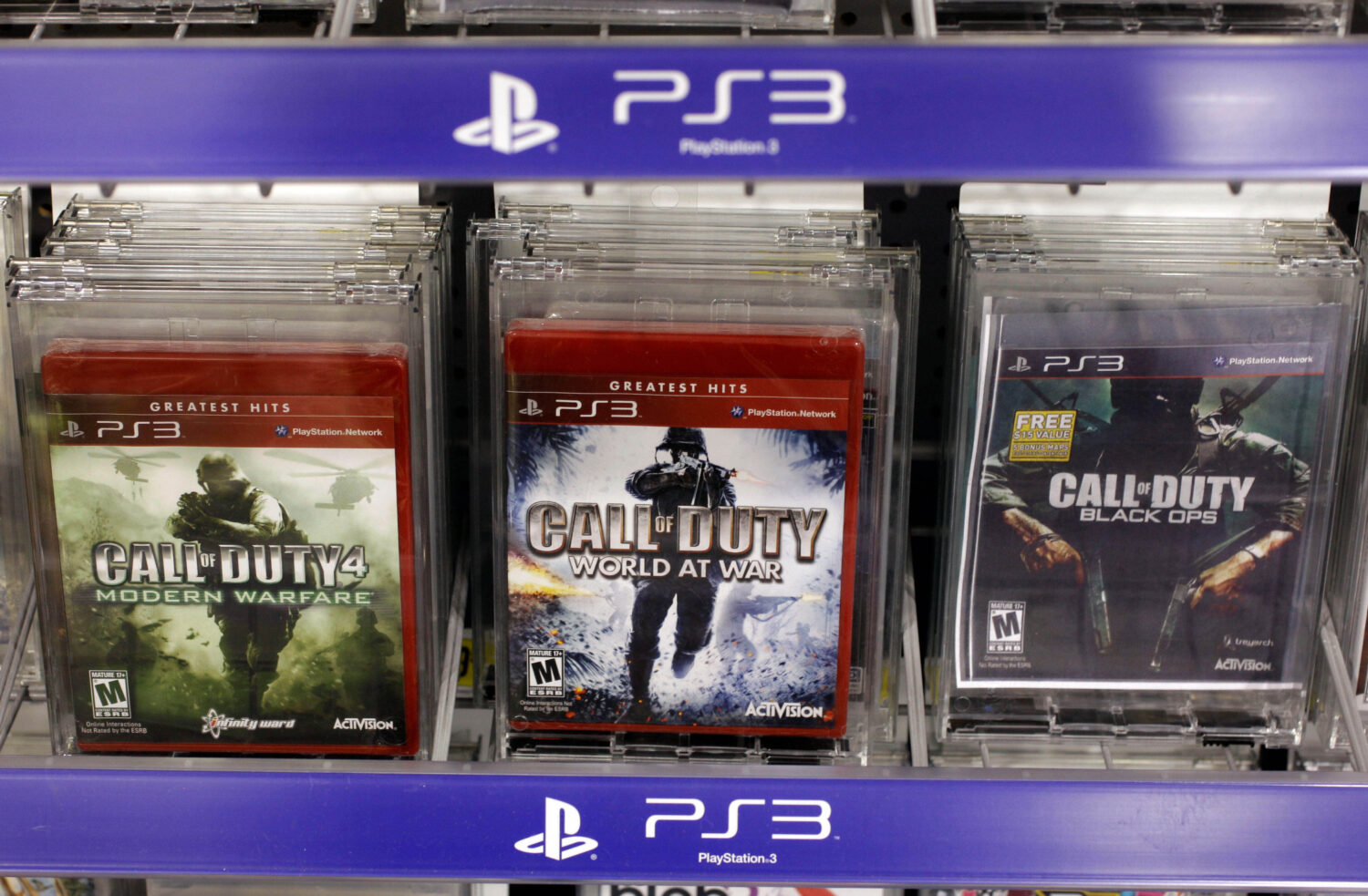 FILE - Three versions of Activision's Call Of Duty games are seen on sale at Best Buy, in Mountain ...