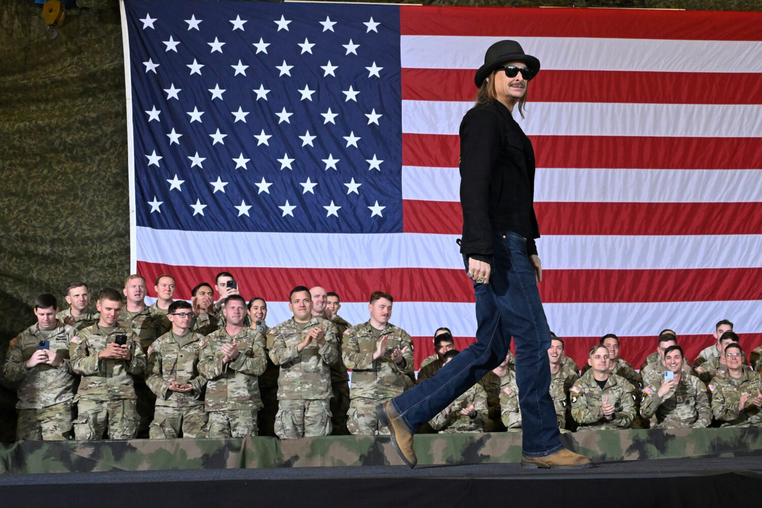 FILE - Kid Rock comes on stage to speak and introduce Vice President JD Vance during a visit to For...