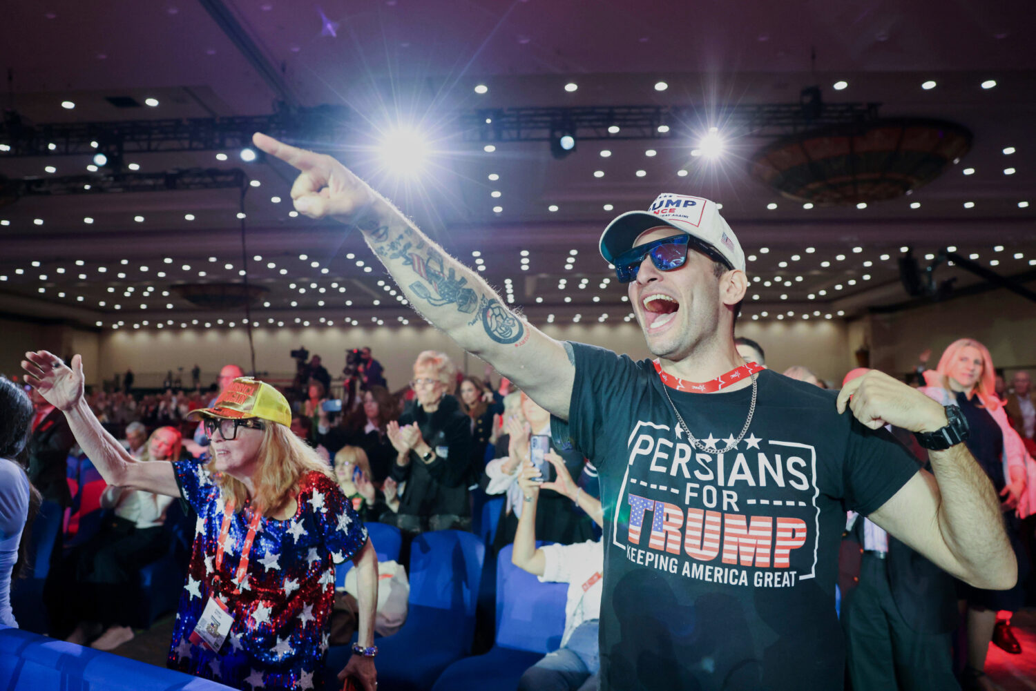 Attendees cheer as White House Border Czar Tom Homan exits the stage during Conservative Political ...