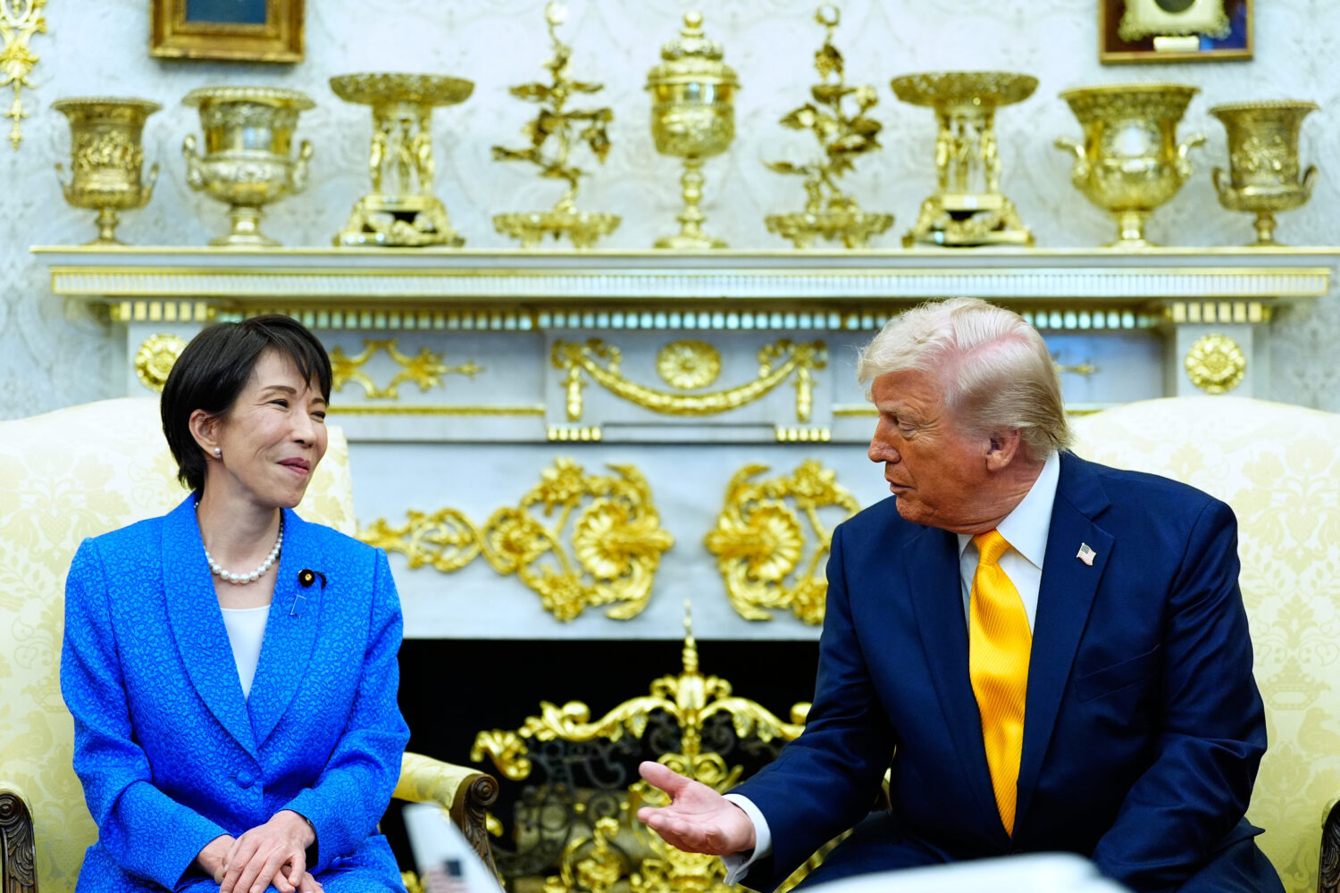 President Donald Trump speaks with Japan's Prime Minister Sanae Takaichi in the Oval Office of the ...