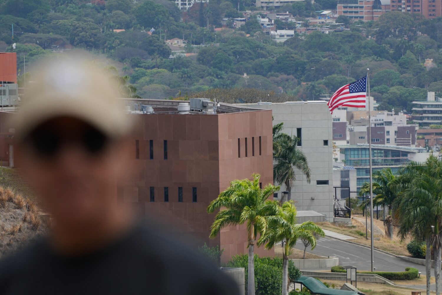 An American flag flies again at the US Embassy in Caracas, Venezuela, Saturday, March 14, 2026, sev...