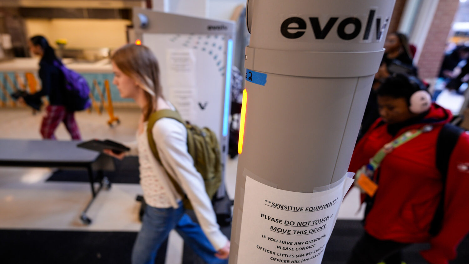 Students enter a security checkpoint at Midtown High School, Friday, March 6, 2026, in Atlanta. (AP...