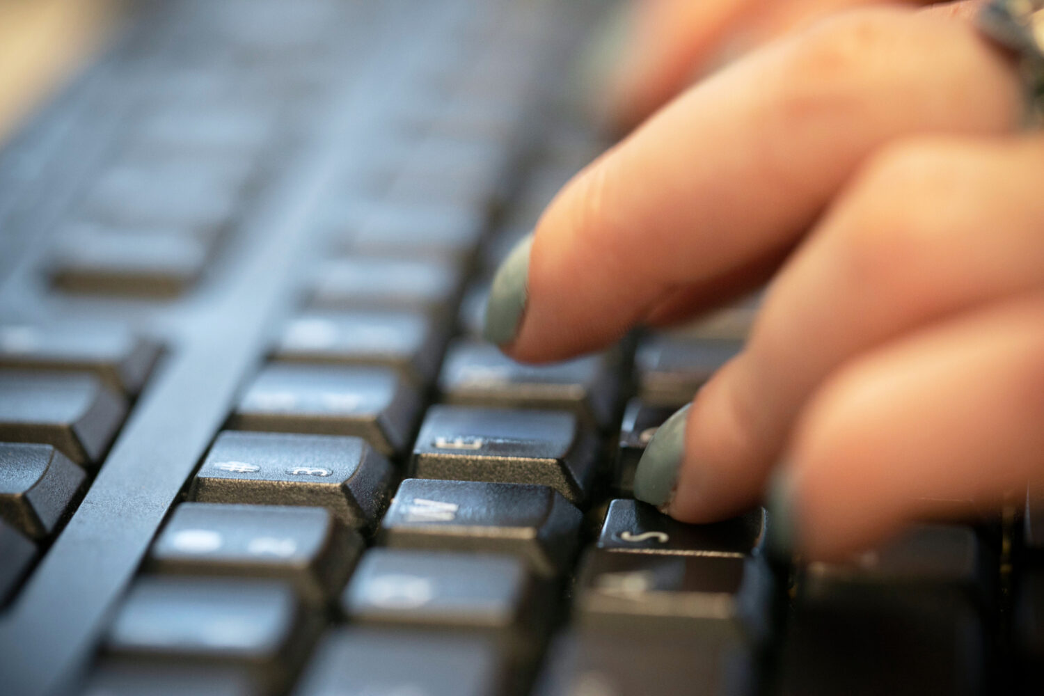 FILE - A person types on a computer keyboard in New York, Oct. 8, 2019. (AP Photo/Jenny Kane, File)...