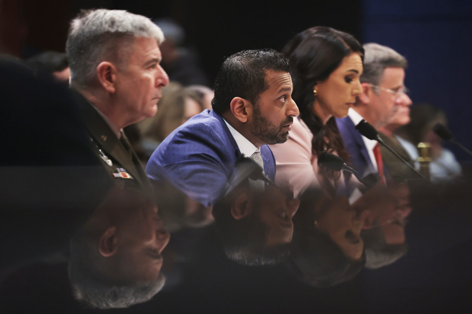 From left, Acting Commander of the U.S. Cyber Command William Hartman, FBI Director Kash Patel, Dir...