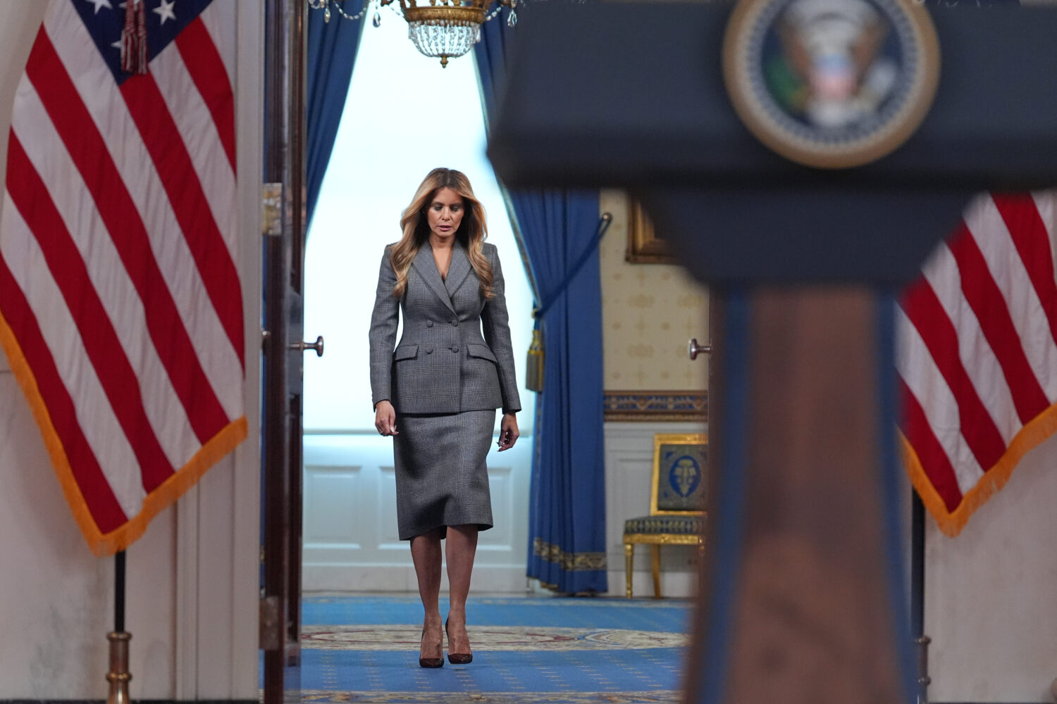 First lady Melania Trump arrives to speak with reporters Thursday, April 9, 2026, in the Grand Foye...