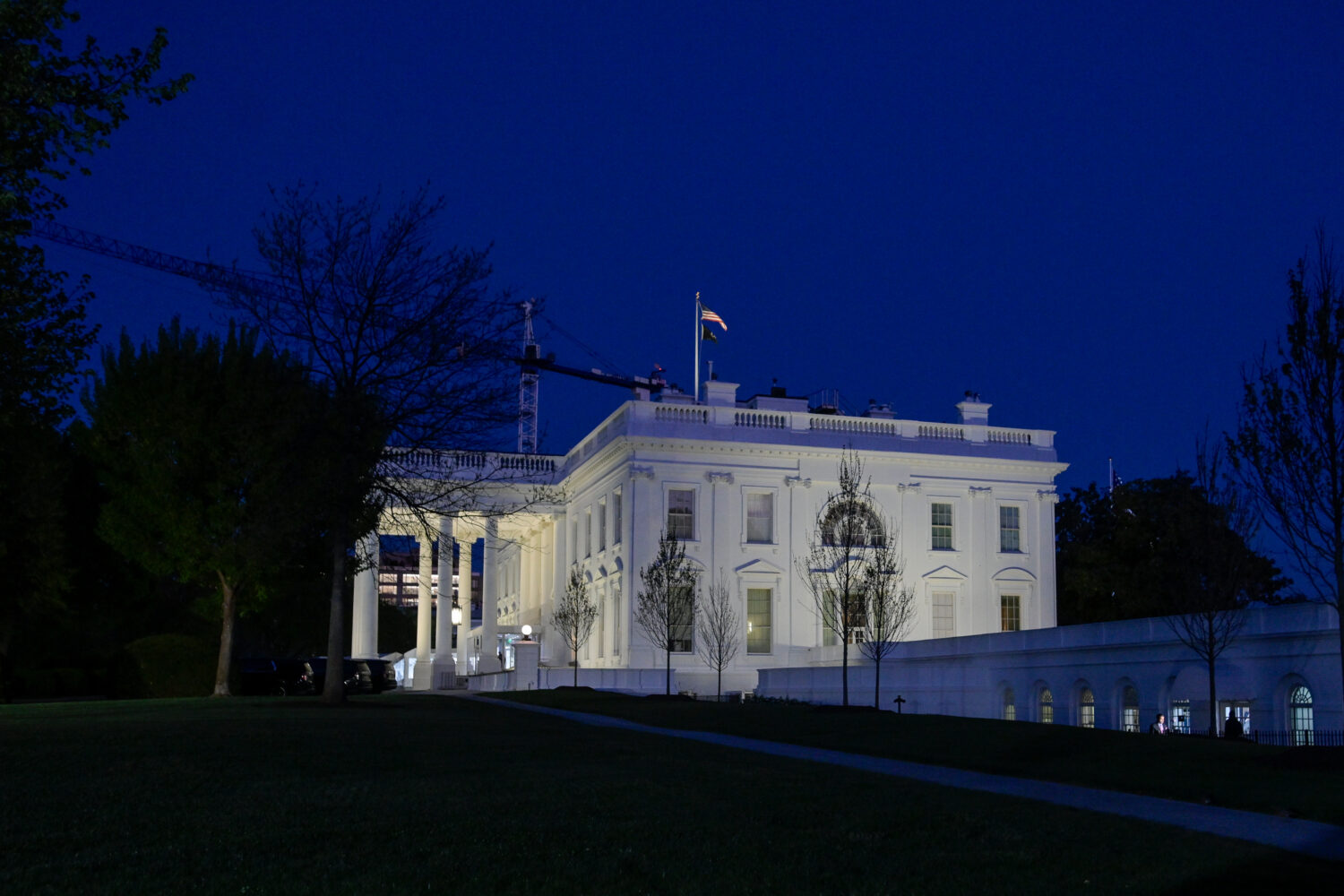 The White House is seen in Washington, Tuesday, April 7, 2026, at 8:00 p.m. EDT. (AP Photo/Rod Lamk...