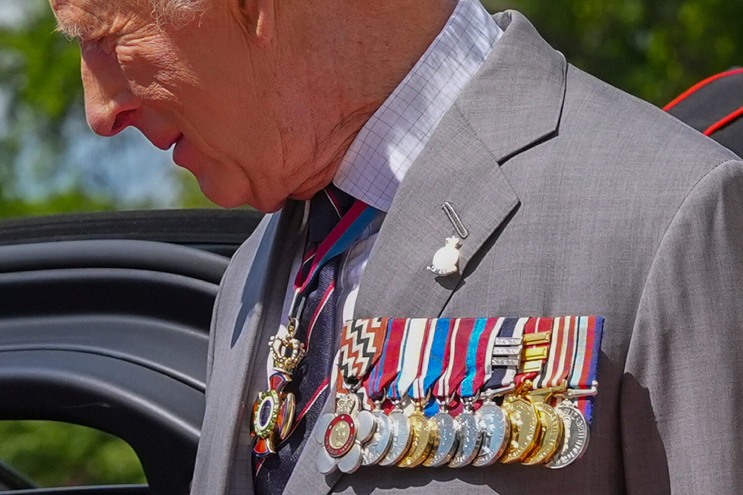 Britain's King Charles III walks to his vehicle during the departure from the South Lawn of the Whi...