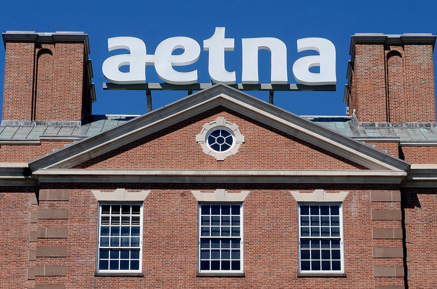 FILE - The corporate sign atop Aetna headquarters is seen Aug. 19, 2014, in Hartford, Conn. (AP Pho...
