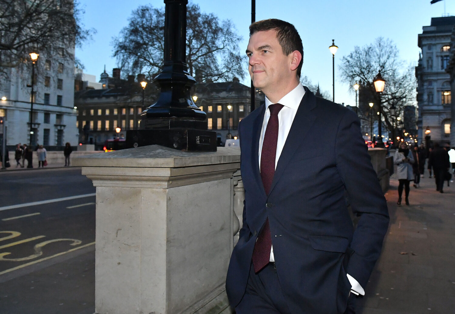 FILE - Olly Robbins walks on Whitehall in Westminster, London, Jan. 17, 2019. (Dominic Lipinski/PA ...