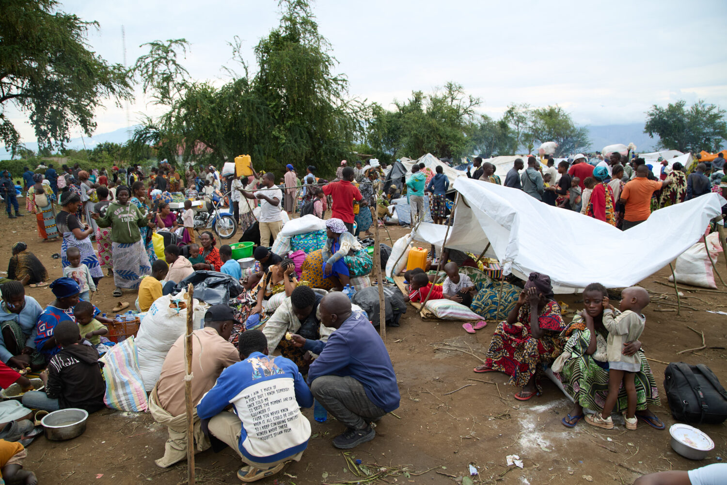 FILE -Internally displaced people (IDPs) fleeing fighting in Congo's South Kivu province arrive in ...