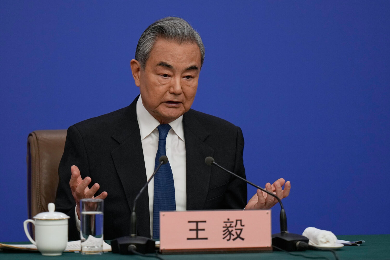 Chinese Foreign Minister Wang Yi speaks during a press conference on the sideline of the National P...