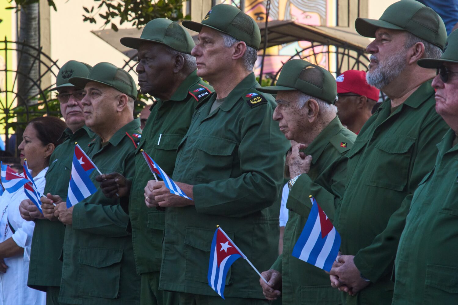 Cuban President Miguel Diaz-Canel, center, attends a celebration marking the 65th anniversary of th...
