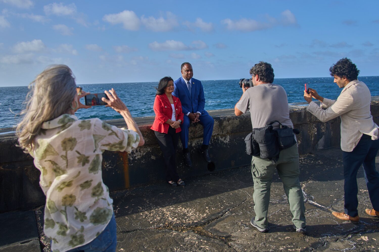 U.S. lawmakers Pramila Jayapal, D-Wash., center left, and Jonathan Jackson, D-Ill., pose for photoj...