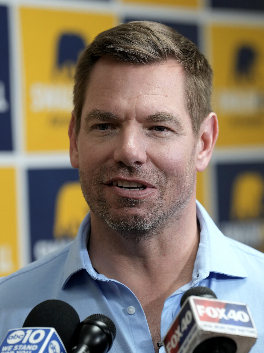 California gubernatorial candidate Rep. Eric Swalwell, D-Calif., talks with reporters after holding...