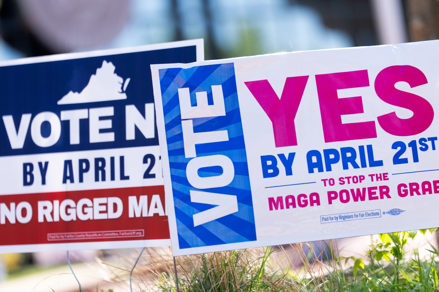 Signs are seen outside Fairfax Government Center during the Virginia redistricting referendum, Tues...