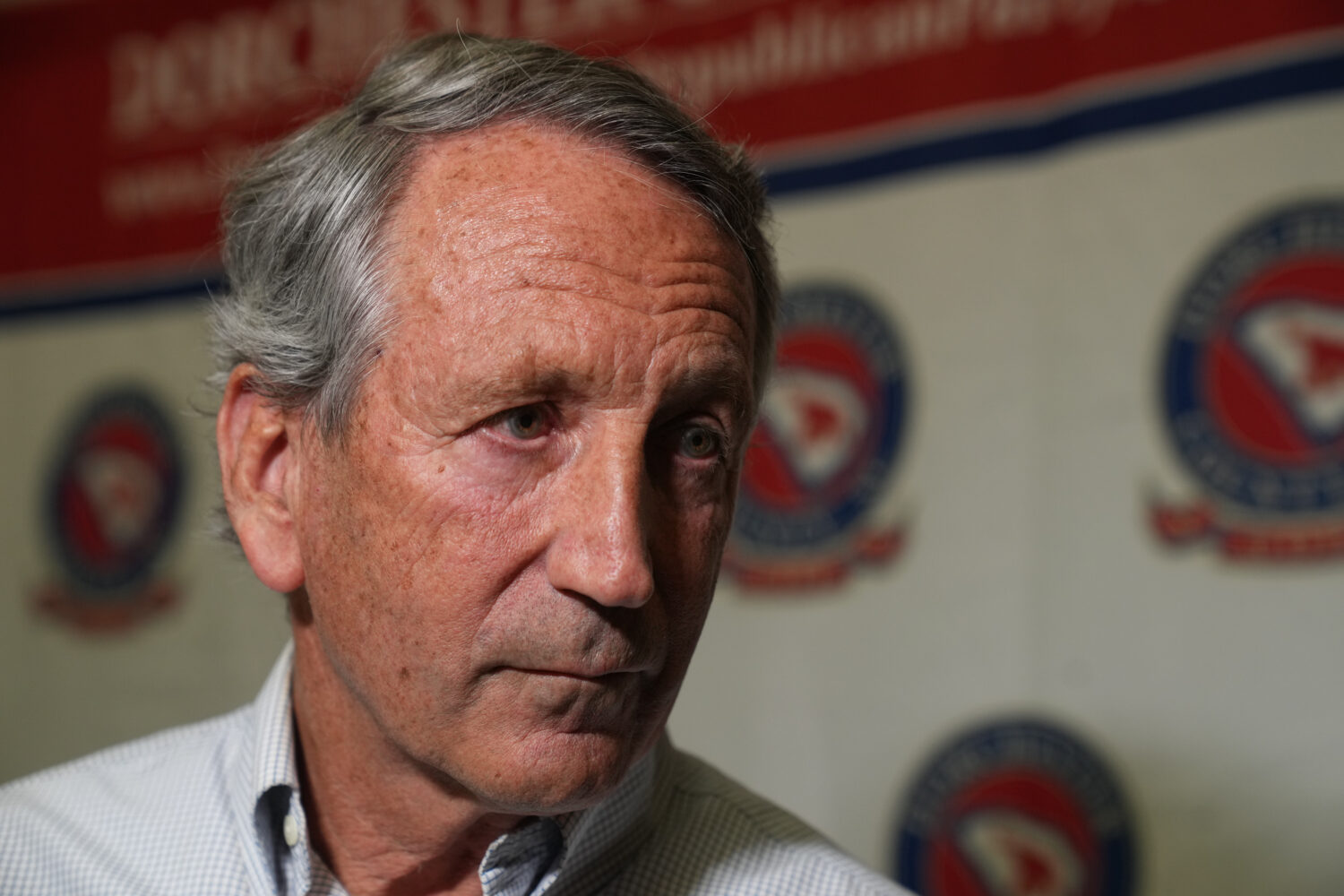 Mark Sanford, former congressman and South Carolina governor, takes questions from reporters as he ...