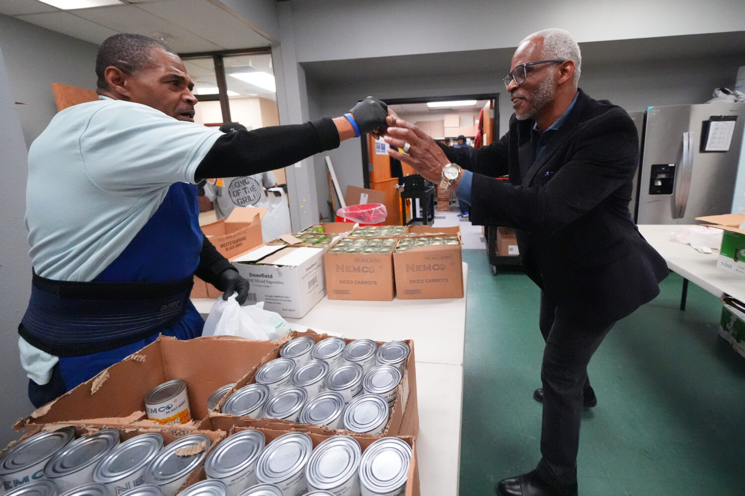 Richard Miles, right, founder and CEO of Miles of Freedom, a Dallas-based group that provides help ...