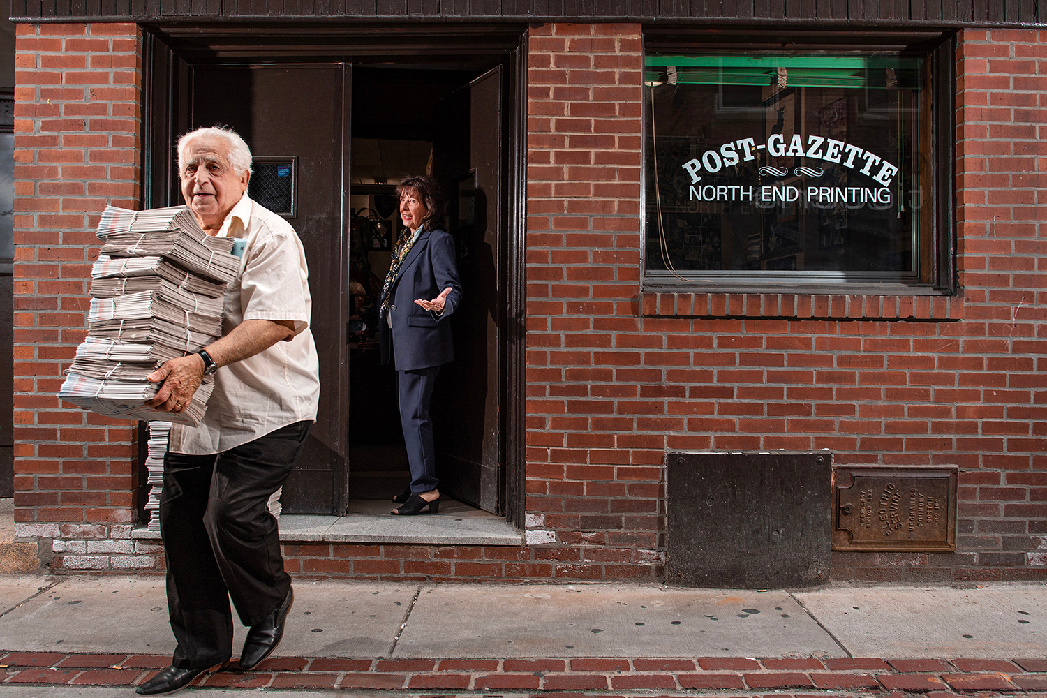 This photo provided by Ann Hermes shows Louie Graffeo delivering copies of The Post-Gazette for his...