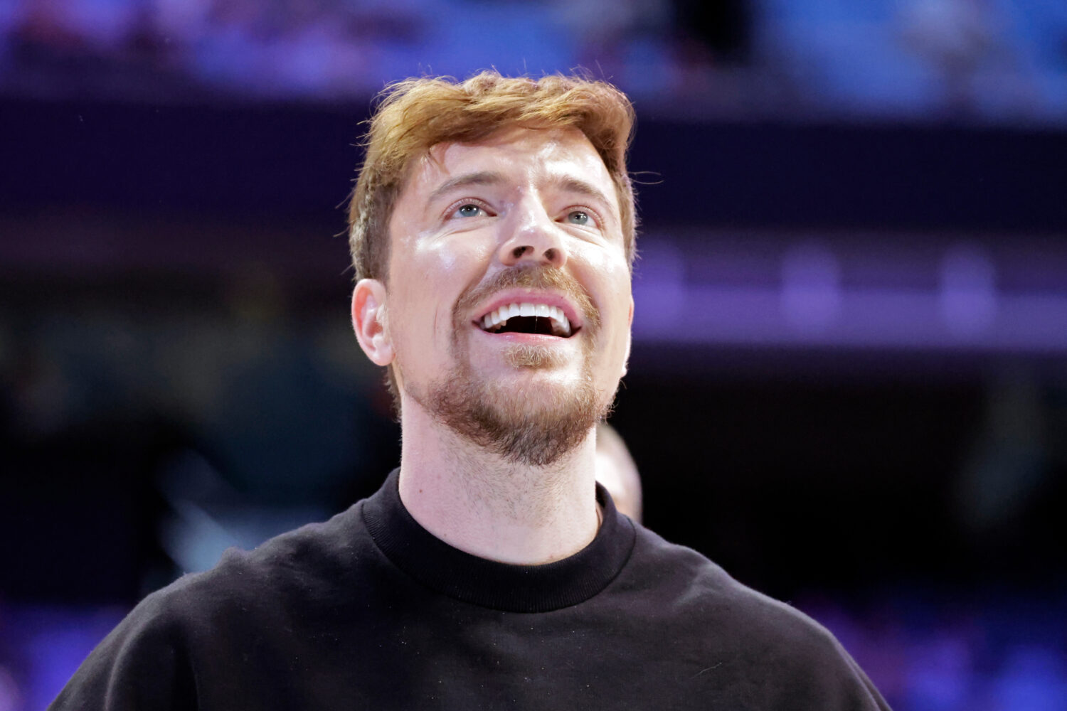 FILE - YouTube personality MrBeast, aka Jimmy Donaldson, watches a contestant's shot in a free thro...