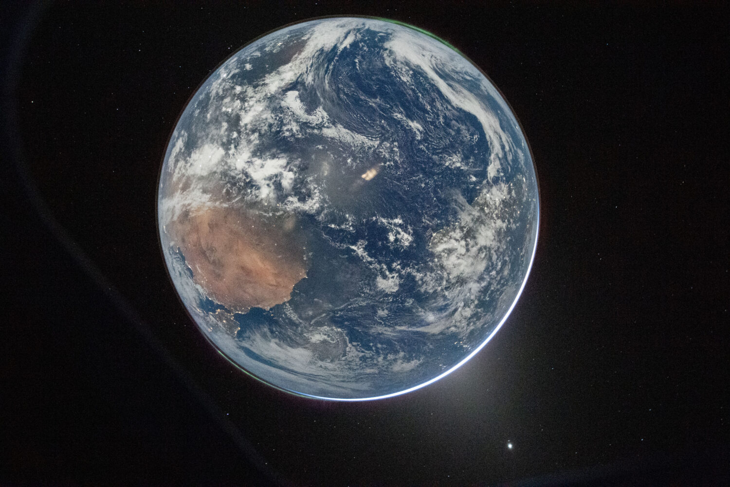 This image provided by NASA shows a view of Earth taken by NASA astronaut and Artemis II Commander ...