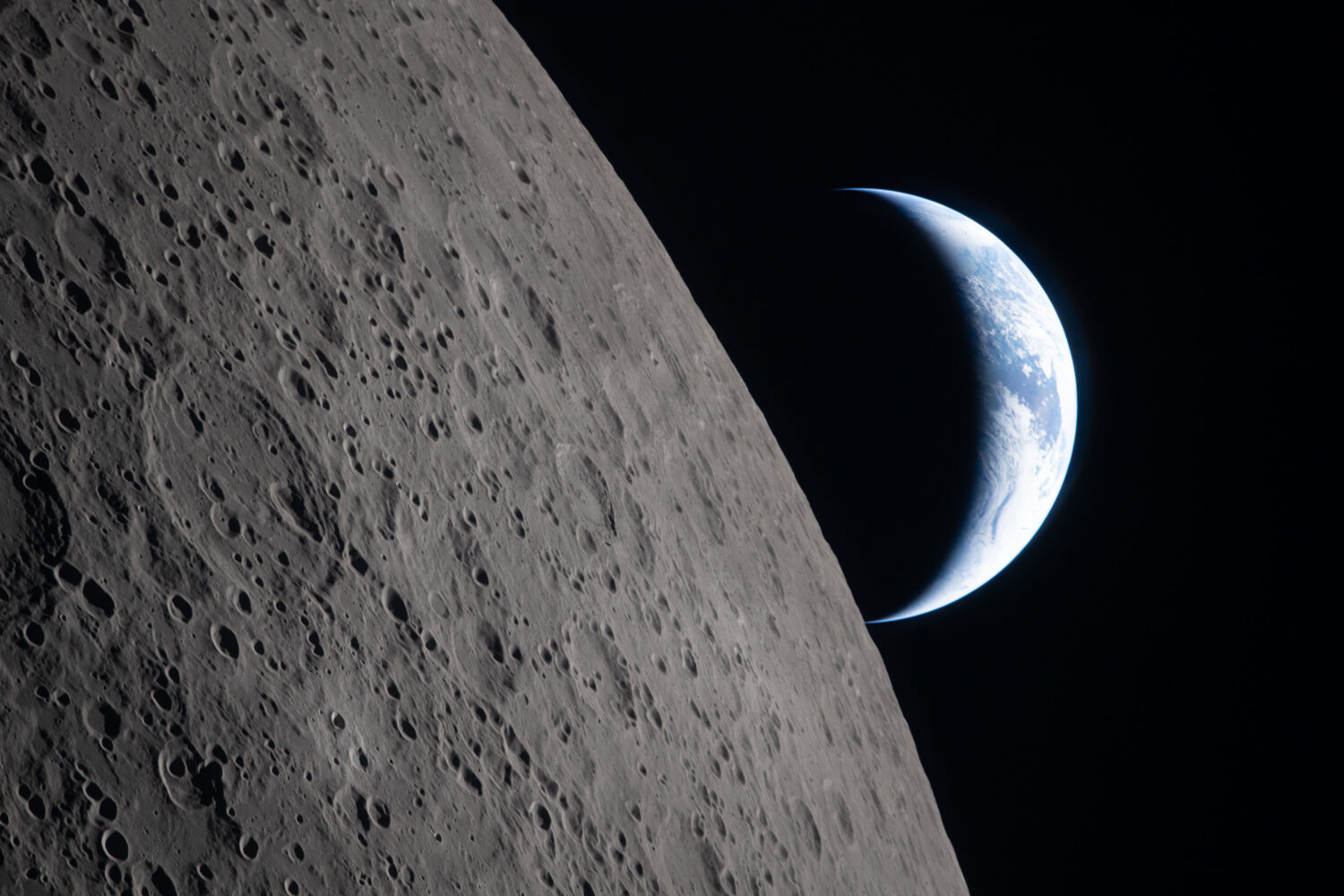 In this image provided by NASA, the Artemis II crew captured this view as the Earth sets behind the...