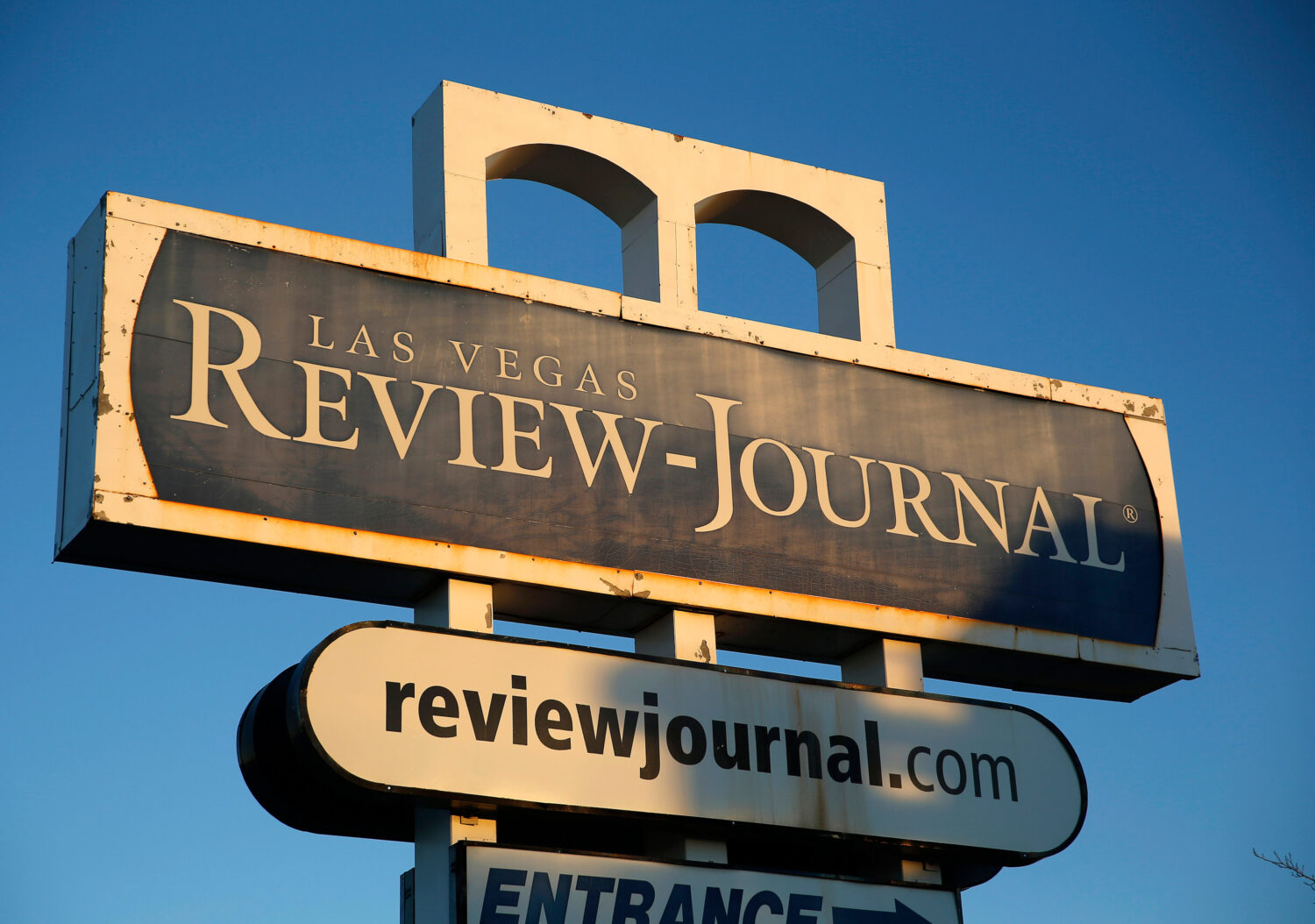 FILE - This Dec. 17, 2015 file photo shows a sign outside the building housing the Las Vegas Review...