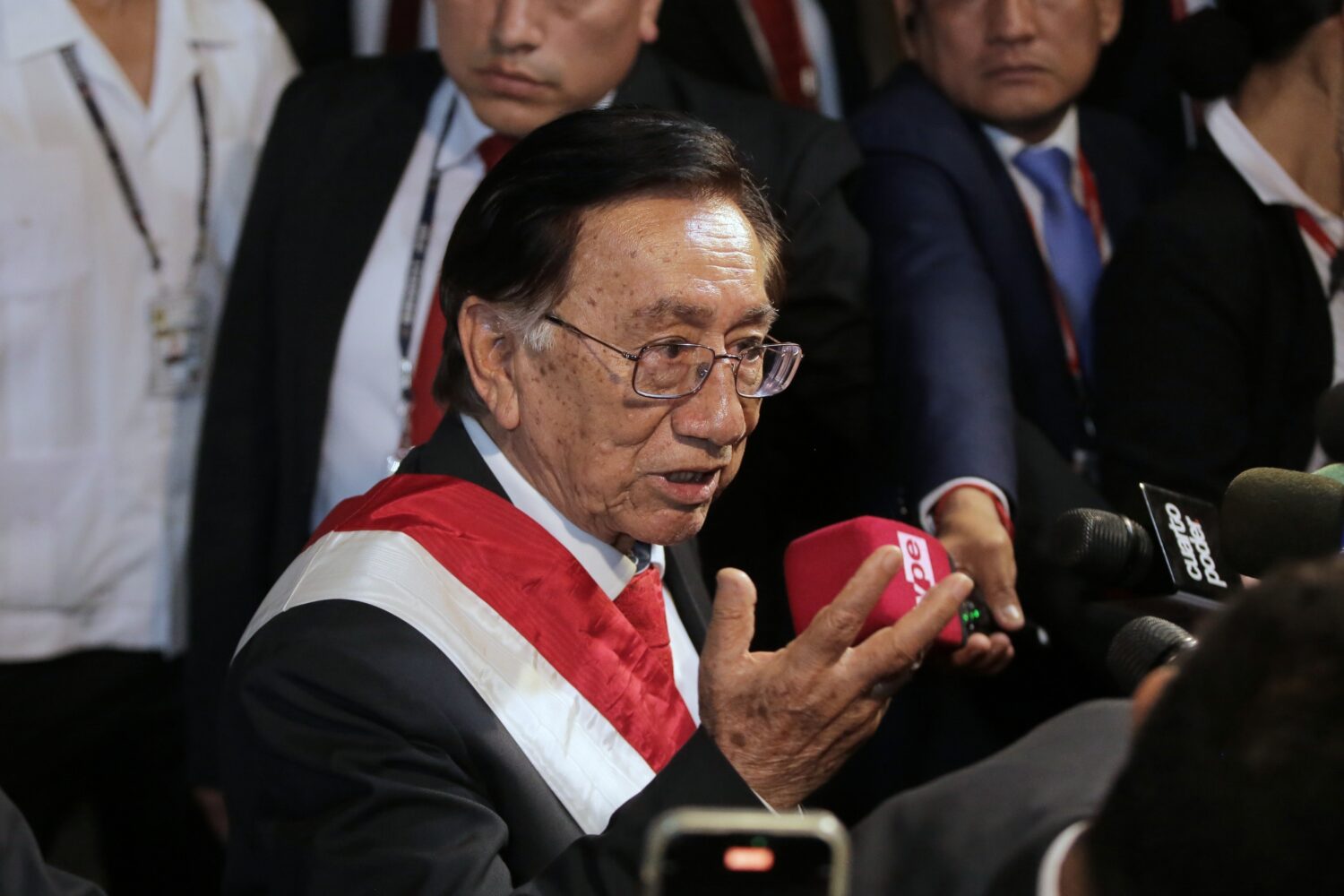 FILE - Interim President Jose Maria Balcazar speaks to reporters upon arriving at the presidential ...