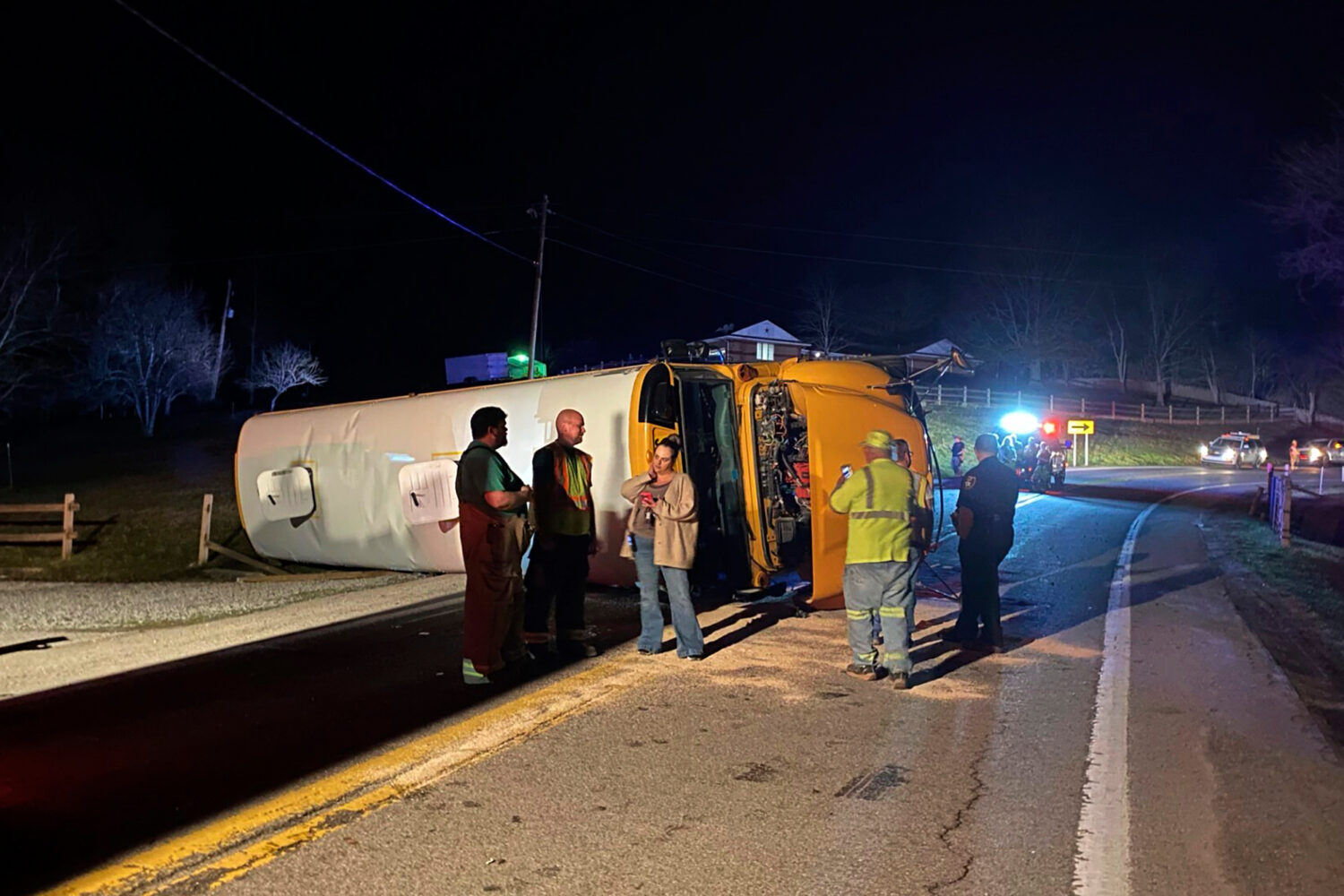 FILE - Emergency personnel respond to the scene of a bus crash, March 4, 2024, on West Virginia Rou...