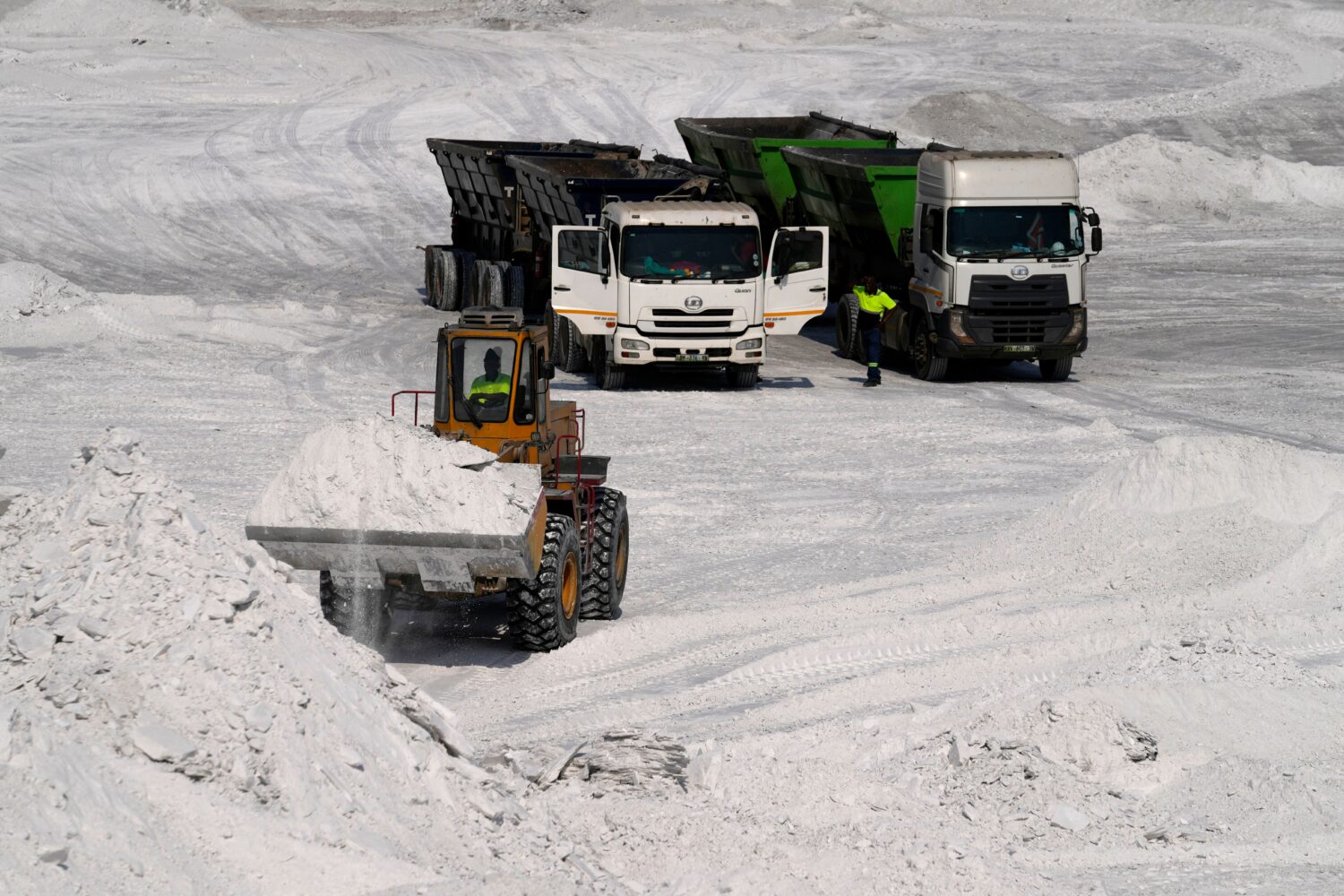A front-end loader transports phosphogypsum in Phalaborwa, South Africa, Monday, Sept. 8, 2025. (AP...