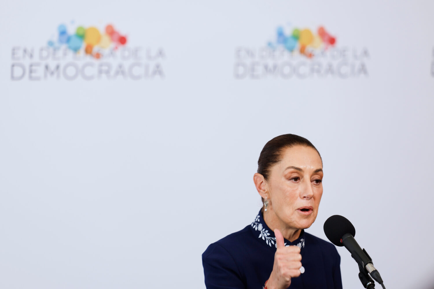 Mexican President Claudia Sheinbaum addresses the media at the Meeting in Defence of Democracy summ...