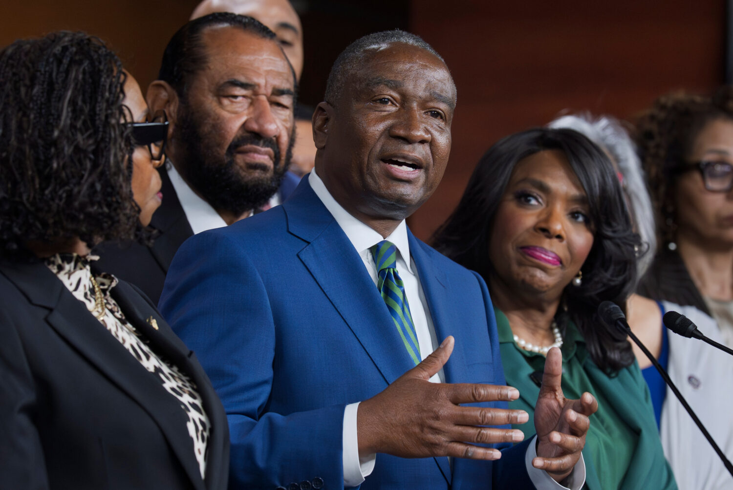 Rep. Cleo Fields, D-La., center, who represents Louisiana's 6th congressional district, is joined b...
