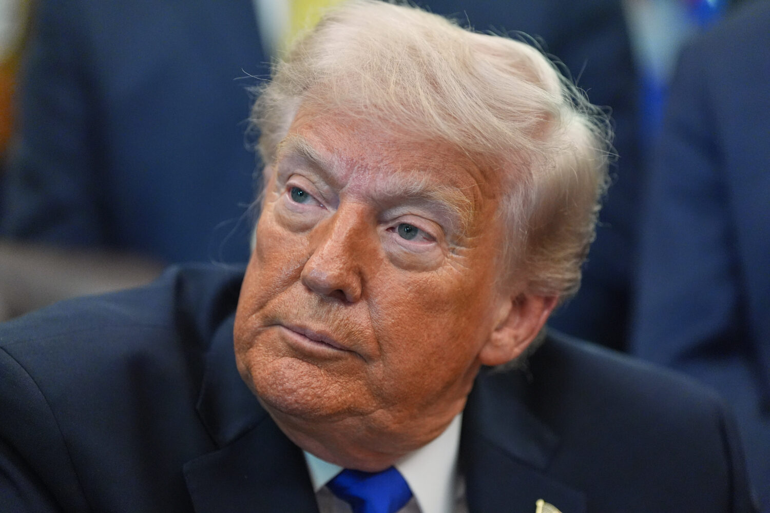 President Donald Trump speaks to reporters in the Oval Office of the White House, Thursday, April 3...