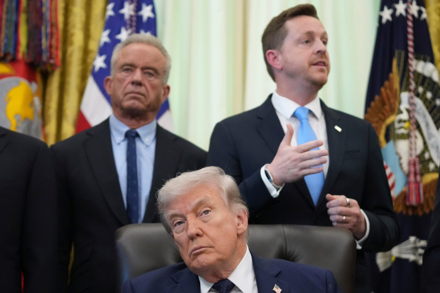 Chris Klomp, director of the Centers for Medicare and Medicaid Services, right, speaks as President...