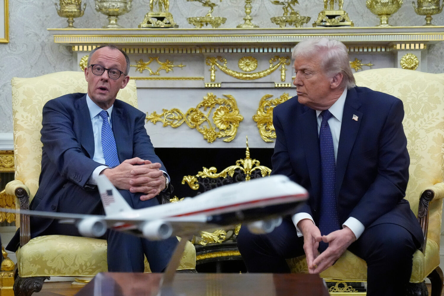 FILE - President Donald Trump meets with German Chancellor Friedrich Merz in the Oval Office at the...