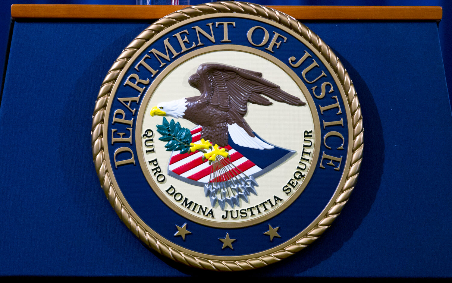 FILE - The Department of Justice seal is seen in Washington, Nov. 28, 2018. (AP Photo/Jose Luis Mag...