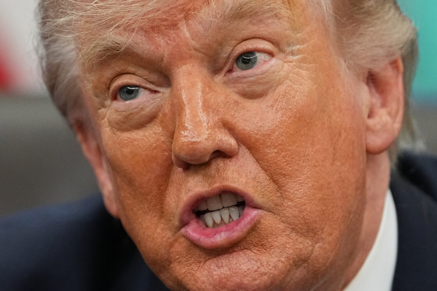 President Donald Trump speaks to reporters as he meets with NASA's Artemis II astronauts Victor Glo...