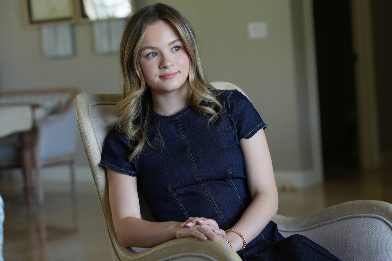 Lauryn Muller sits at her home Monday, April 13, 2026, in Coral Springs, Fla. (AP Photo/Marta Lavan...