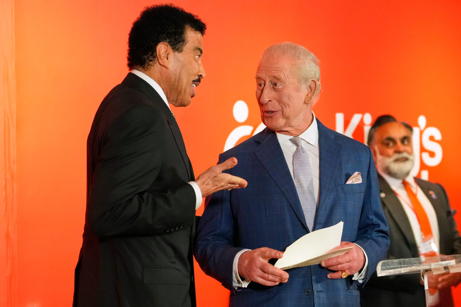 Lionel Richie speaks with Britain's King Charles III during a cultural reception Wednesday, April 2...
