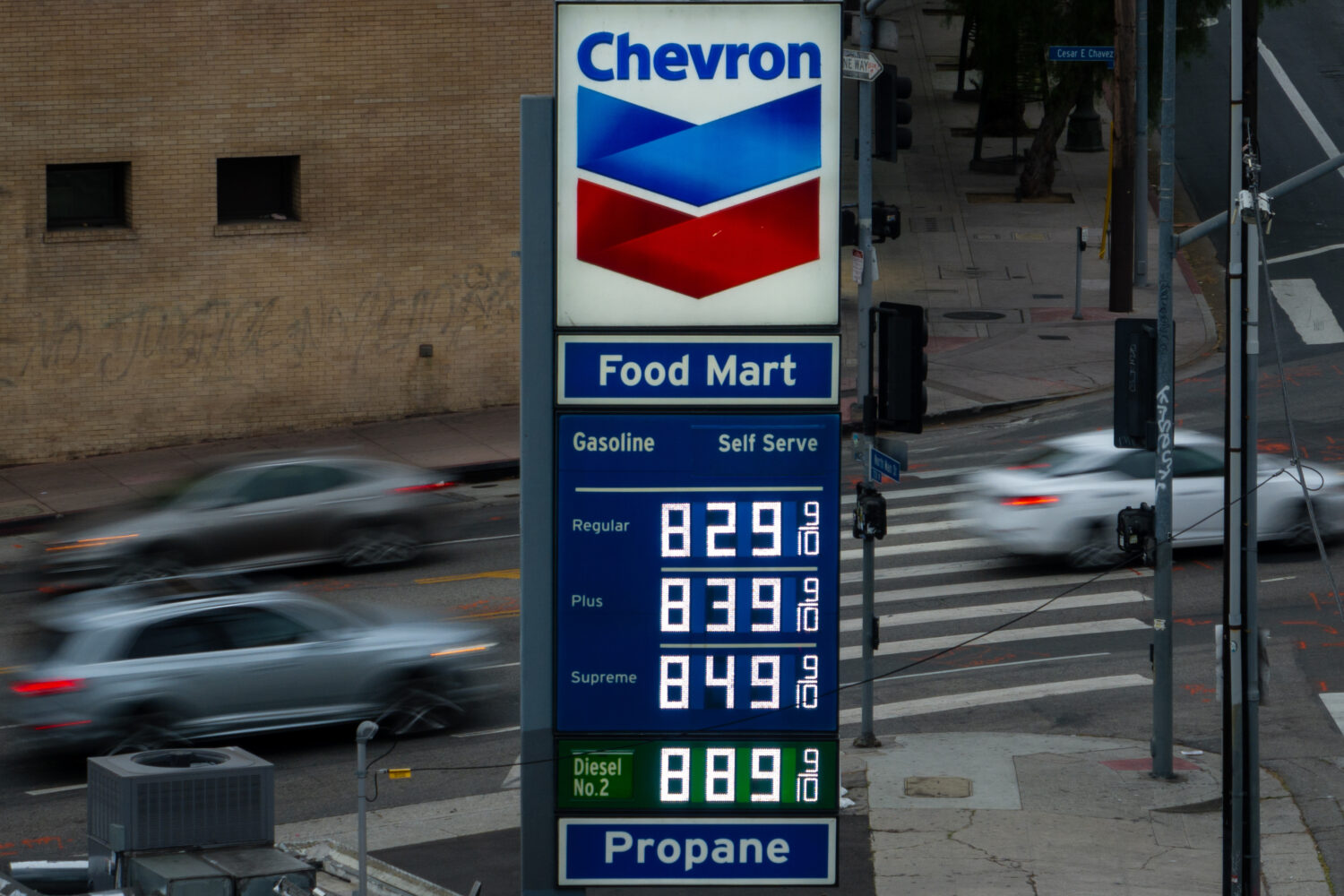 Gas prices are displayed at a Chevron gas station, in downtown Los Angeles, Tuesday, March 31, 2026...