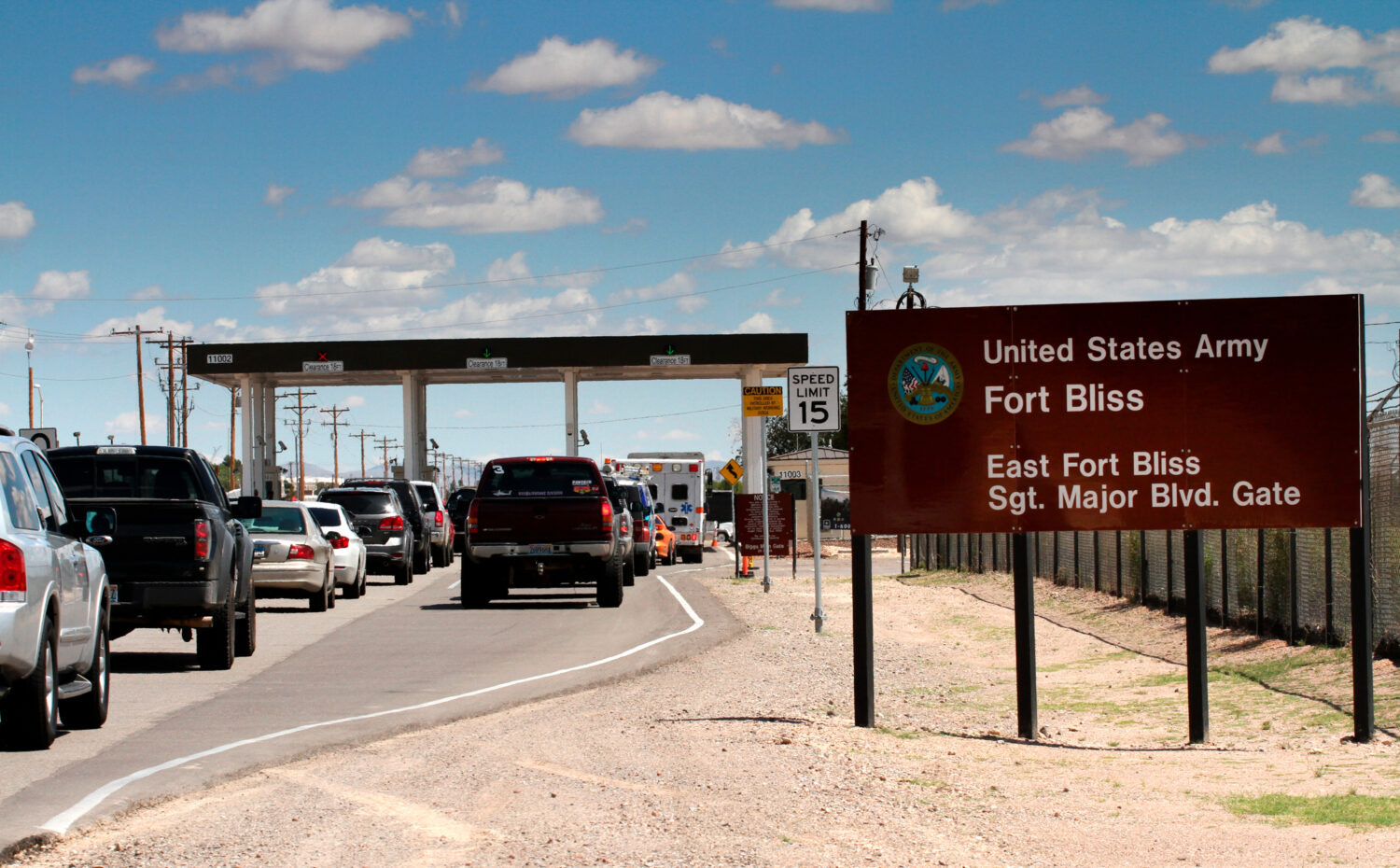 FILE - Cars wait to enter Fort Bliss, Texas, Sept. 9, 2014. (AP Photo/Juan Carlos Llorca, File)Cred...